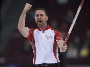 Team Newfoundland and Labrador skip Brad Gushue reacts as his final stone stops in the house to score the winning point over Team B.C. in round robin competition at the Brier curling championship in Ottawa on Thursday, March 10, 2016.