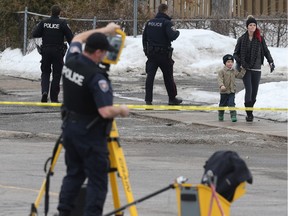 Ottawa Police investigate the city's 5th homicide of 2016 at the corner of Jasmine Crescent and Ogilvie Road.