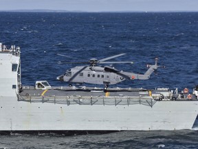 A CH-148 Cyclone helicopter prepares to land on HMCS Montreal off the coast of Halifax Harbour, Shearwater, Nova Scotia on March 3, 2016.  

Photo: Cpl Anthony Laviolette, Shearwater, N.S
SW2016-0033-01