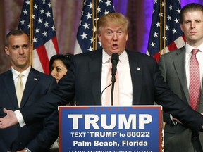 Republican presidential candidate Donald Trump speaks to supporters at a primary event in Palm Beach, Fla.