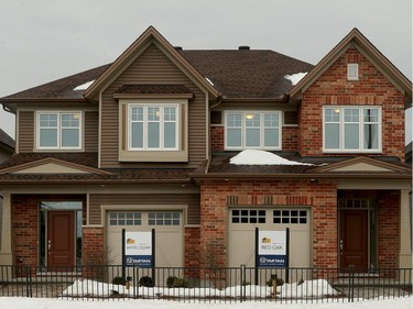 The White Cedar, left, and Red Oak are semi-detached homes that live like singles.