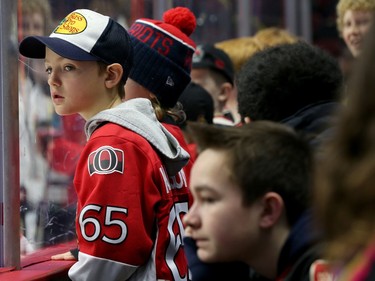 An Erik Karlsson fan looks for his favourite player.