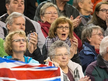 Fans react to a shot as the Tim Horton's Brier continues on Sunday at TD Place in Ottawa.