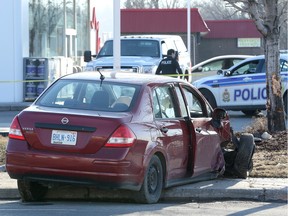 Crash outside gas station at the corner of Greenbank and Fallowfield in Barrhaven Sunday.