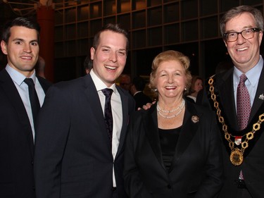 From left, Brendan McGovern, special assistant to Mayor Jim Watson, with Coun. Mathieu Fleury, Bea Ross and Jim Watson at Ottawa City Hall on Tuesday, March 22, 2015, for a reception that followed the mayor's presentation of the Key to the City to Chief Justice Beverley McLachlin.