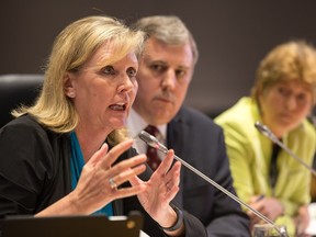 From left- Councillor Diane Deans, Anthony Di Monte, Ottawa's acting general manager of emergency and protective services, and Susan Jones, deputy city manager of city operations, answer questions as the city releases it's proposal to change taxi regulations that will include the existence of Private Transportation Companies like Uber.