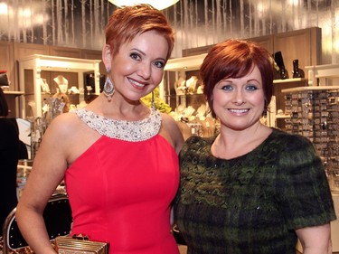 From left, Elaine Charron with Samantha Poole, general manager of Shepherd's Fashions, at a benefit night held at the store on Tuesday, March 1, 2016.