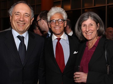 From left, Italian Ambassador Gian Lorenzo Cornado with lawyer Jacques Shore and his wife, Dr. Donna Shore, at a reception held at Ottawa City Hall on Tuesday, March 22, 2016, following the presentation of the Key to the City to Supreme Court of Canada Chief Justice Beverley McLachlin.