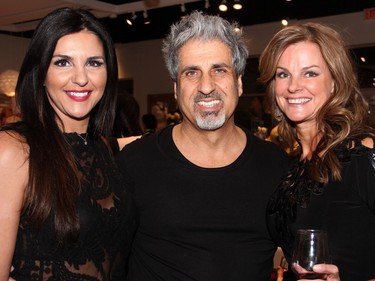 From left, Laila Saikaley and her husband, Eli Saikaley, from Water Salon & Spa, with event coordinator Paula Thebarge at Shepherd's store in the Ottawa Train Yards shopping district, on Tuesday, March 1, 2016.