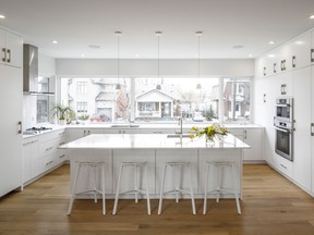 A spectacular wall-to-wall kitchen window is 'almost like sitting on a porch,' says architect Christopher Simmonds, who won a 2015 housing award along with RND Construction for the project.