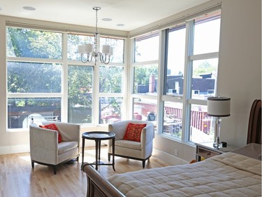 The window frames, like picture frames, carry your eye to the outside in this Robertson House renovation by Hamel Design. The rhythmic, multi-pane design also 'gives a sense of scale and a degree of finesse on what could have otherwise been huge panes of glass,' says Jacques Hamel. There’s a pragmatic element at work as well, he says: smaller windows can open, very large ones can’t.