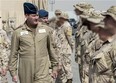 Lieutenant-General Michael Hood, Commander of the Royal Canadian Air Force, inspects the troops during the Operation IMPACT Mission Transition Parade, in Kuwait, on March 5, 2016. DND photo.