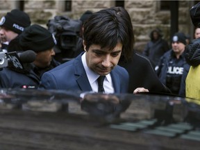Jian Ghomeshi leaves court in Toronto on Thursday, March 24, 2016. Ghomeshi was acquitted on all charges of sexual assault and choking following a trial that sparked a nationwide debate on how the justice system treats victims.