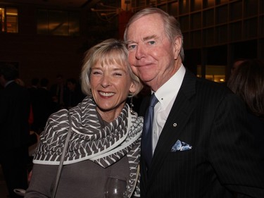 Historian and author Charlotte Gray with Don Newman at Ottawa City Hall on Tuesday, March 22, 2016, for the presentation of the Key to the City to Supreme Court Chief Justice Beverley McLachlin.