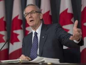 Ian Binnie, special arbitrator for the Senate dispute resolution process, speaks during a news conference in Ottawa, Monday, March 21, 2016.