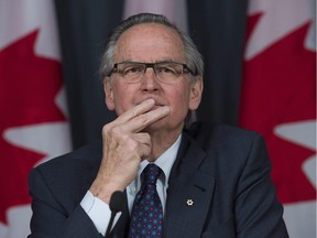 Ian Binnie, special arbitrator for the Senate dispute resolution process, speaks during a news conference in Ottawa, Monday, March 21, 2016.