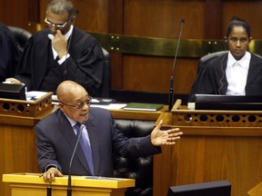 South African president Jacob Zuma, answers question during parliament from the DA, Democratic Alliance political party in Cape Town, South Africa, Thursday, March. 17,  2016. In a tumultuous session of Parliament on Thursday, South Africa's president rejected allegations that he is influenced by a wealthy business family, saying that he is in charge of the appointment of Cabinet ministers.