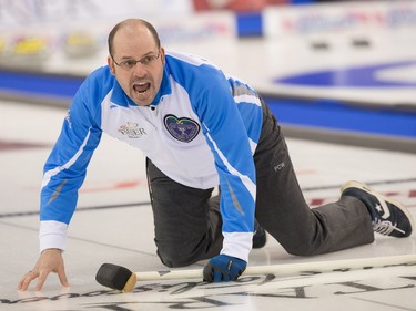 Jean-Michel Ménard of Quebec watches his last shot against Northern Ontario as the Tim Horton's Brier continues on Sunday at TD Place in Ottawa.