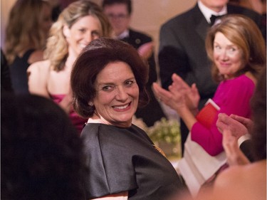 Margaret Trudeau, mother of Prime Minister Justin Trudeau is applauded as she is introduced by US President Barack Obama during a state dinner Thursday, March 10, 2016 in Washington.