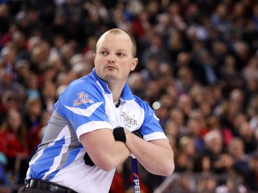 Martin Crete, third of Team Quebec, follows the action against Team Canada at the Tim Hortons Brier at TD Place in Ottawa, March 05, 2016.
