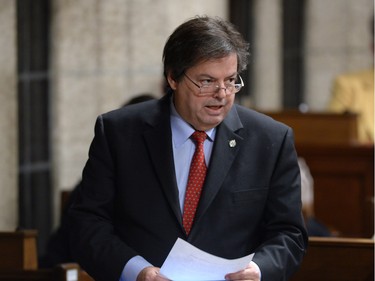 Liberal MP Mauril Belanger answers a question during Question Period in the House of Commons in Ottawa, on Monday, Dec. 7, 2015.