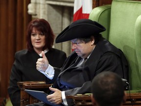 Liberal MP Mauril Bélanger gives a thumbs-up as he sits in the speaker's chair to preside over the House of Commons last week.