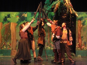 Meg Scathelocke played by Taylor Burnside (L), Much played by Rosaleen Nguyen (2ndFL), Arthur-a-Bland played by Rose Montroy (3rdFL), Little John played by Samuel Hickey (M), Will Gamwell (Scarlet) played by Yasir Nur (3rdFR), Robin Hood played by Danny Katabazi (2ndFR), Alan-a-Dale played by Rowan Ross (R), during Notre Dame High School's Cappies production of Robin Hood, on Mar. 9, 2016.