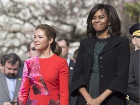 First lady Michelle Obama and Sophie Grégoire-Trudeau, stand together during the arrival ceremony at the White House, Thursday March 10, 2016 in Washington.