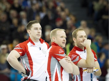 Newfoundland/Labrador team membes L-R Brett Gallant, Mark Nicols and Geoff Walker during the gold medal game at the Tim Hortons Brier held at TD Place Arena Sunday March 13, 2016.
