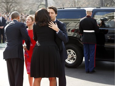 President Barack Obama and first lady Michelle Obama greet Canadian Prime Minister Justin Trudeau and Sophie Grégoire-Trudeau, as they arrive at the White House, Thursday March 10, 2016 in Washington.