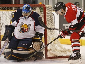 Ottawa 67s' Austen Keating (9) tries to beat Barrie Colts' Mackenzie Blackwood (29) during the first period of OHL hockey action at TD Place Wednesday March 16, 2016.