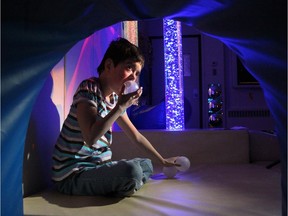 Marie-Helene Barbeau, 14, who has severe autism and developmental delays, enjoys the Snoezelen Room at Clifford Bowey Public School. It's a  therapeutic sensory room that uses lights, fabrics, fibre optics and textured cloth to provide  stimulation and relaxation through the use of smell, touch, sound, colour and light.