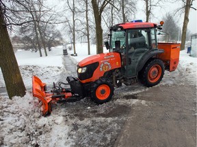 File photo of a plow clearing ice and snow on Abbeyhill Rd in Kanata.