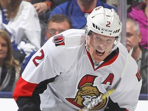 Dion Phaneuf #2 of the Ottawa Senators is in pain after a slash from Leo Komarov #47 of the Toronto Maple Leafs during an NHL game at the Air Canada Centre on March 5,2016 in Toronto, Ontario, Canada. The Senators defeated the Maple Leafs 3-2.