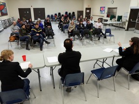 Parents from Elgin Street Public School hold a meeting at the Jack Purcell Community Centre to discuss what to do about overcrowding Wednesday February 23, 2016.