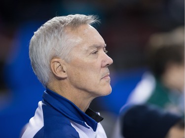Pat Ryan, coach of British Columbia, watches his players as the Tim Horton's Brier continues on Sunday at TD Place in Ottawa.