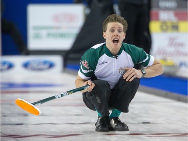 PEI skip Adam Casey shouts while playing Alberta as the Tim Horton's Brier continues on Sunday at TD Place in Ottawa.