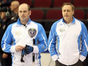 Pierre Charette (R) and Skip Jean-Michel Ménard  of Team Quebec during the Tim Horton's Brier held at TD Place in Ottawa, March 08, 2016.