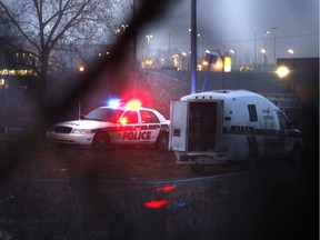 Police investigate the scene of a violent attack near the Robert Guertin arena on Tuesday.