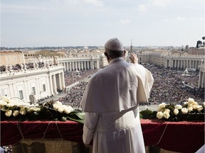 Pope Francis delivers the Urbi et Orbi (to the city and to the world) message at end of the Easter mass, in St. Peter's Square, at the Vatican, Sunday, March 27, 2016. Pope Francis tempered his Easter Sunday message of Christian hope with a denunciation of ''blind'' terrorism, recalling victims of attacks in Europe, Africa and elsewhere, as well as expressing dismay that people fleeing war or poverty are being denied welcome as European countries squabble over the refugee crisis.