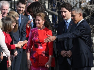 U.S. President Barack Obama welcomes Canadian Prime Minister Justin Trudeau and his wife Sophie Gregoire Trudeau  during an arrival ceremony on the South Lawn of the White House, March 10, 2016 in Washington, DC. This is Trudeau's first trip to Washington since becoming Prime Minister.