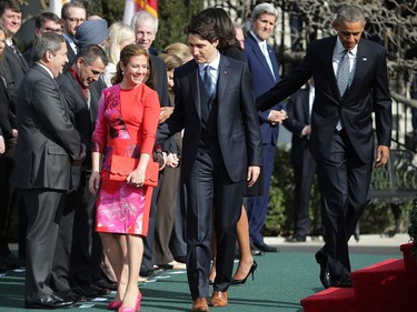 WASHINGTON, DC - MARCH 10:  Canandian Prime Minister Justin Trudeau escorts his wife Sophie Grégoire-Trudeau during an arrival ceremony with U.S. President Barack Obama at the White House, March 10, 2016 in Washington, DC. This is Trudeau's first trip to Washington since becoming Prime Minister.