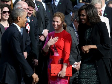 U.S. President Barack Obama and first lady Michelle Obama welcome Canadian Prime Minister Justin Trudeau (not pictured) and his wife Sophie Gregoire Trudeau (C) during an arrival ceremony on the South Lawn of the White House, March 10, 2016 in Washington, DC. This is Trudeau's first trip to Washington since becoming Prime Minister.