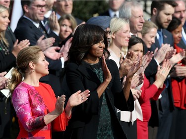 U.S. first lady Michelle Obama stands with Sophie Gregoire Trudeau during an arrival ceremony for Canadian Prime Minister Justin Trudeau (not pictured) on the South Lawn of the White House, March 10, 2016 in Washington, DC. This is Trudeau's first trip to Washington since becoming Prime Minister.