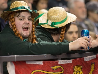 Prince Edward Island fan J.D. Geldert cheers on his team as the Tim Horton's Brier continues on Sunday at TD Place in Ottawa.