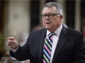 Public Safety Minister Ralph Goodale responds to a question during Question Period in the House of Commons Wednesday February 24, 2016 in Ottawa. Opposition parties say they deserve a seat at the table as the Liberals put together a watchdog committee on national security and intelligence.