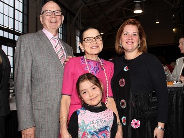 Retired diplomat Larry Dickenson with his wife, food expert and cookbook author Margaret Dickenson, and their daughter, Tanya Dickenson-Tessier and granddaughter, Gabrielle Tessier, at A Taste For Hope, an annual culinary event for the Shepherds of Good Hope held at Lansdowne's Horticulture Building on Wednesday, March 30, 2016.