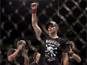 Rory MacDonald from Montreal, Que., salutes the crowd after defeating Tarec Saffiedine from Temecula, California in their welterweight bout at UFC Fight Night 4 in Halifax Saturday, October 4, 2014.