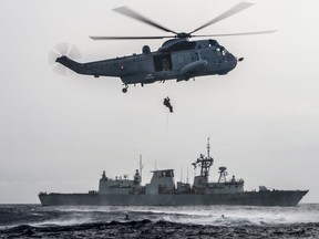 Members of Her Majesty’s Canadian Ship FREDERICTON Air Detachment and the ship's divers perform rescue training from the CH-124 Sea King helicopter during Operation REASSURANCE on March 2, 2016.

Photo: Corporal Anthony Chand, Formation Imaging Services  
HS2016-A038-035
~
Des membres du détachement aérien du Navire canadien de Sa Majesté FREDERICTON et des plongeurs du navire participent à un entraînement au sauvetage depuis l’hélicoptère CH-124 Sea King au cours de l’opération REASSURANCE, le 2 mars 2016.

Photo : Caporal Anthony Chand, Services d’imagerie de la formation   
HS2016-A038-035