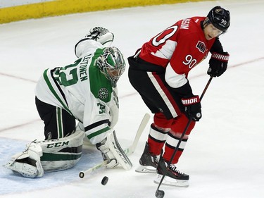 Dallas Stars' goalie Kari Lehtonen (32) prepares to stop a backhand shot by Ottawa Senators' Alex Chiasson (90) during first period NHL hockey action, in Ottawa on Sunday, Mar. 6, 2016.